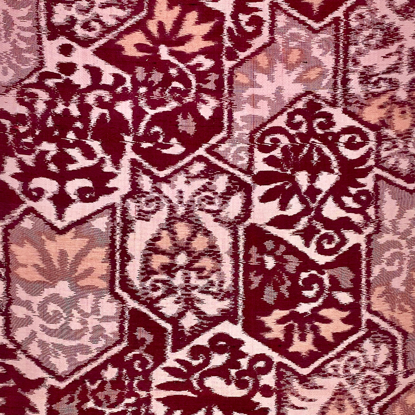 pink and burgundy tsumugi silk in arabesque pattern