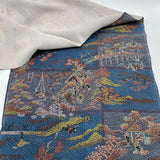 Dark blue vintage Japanese kimono silk fabric with scenery of people on a journey