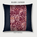 black leather throw pillow with pink silk