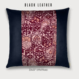 black leather throw pillow with pink silk